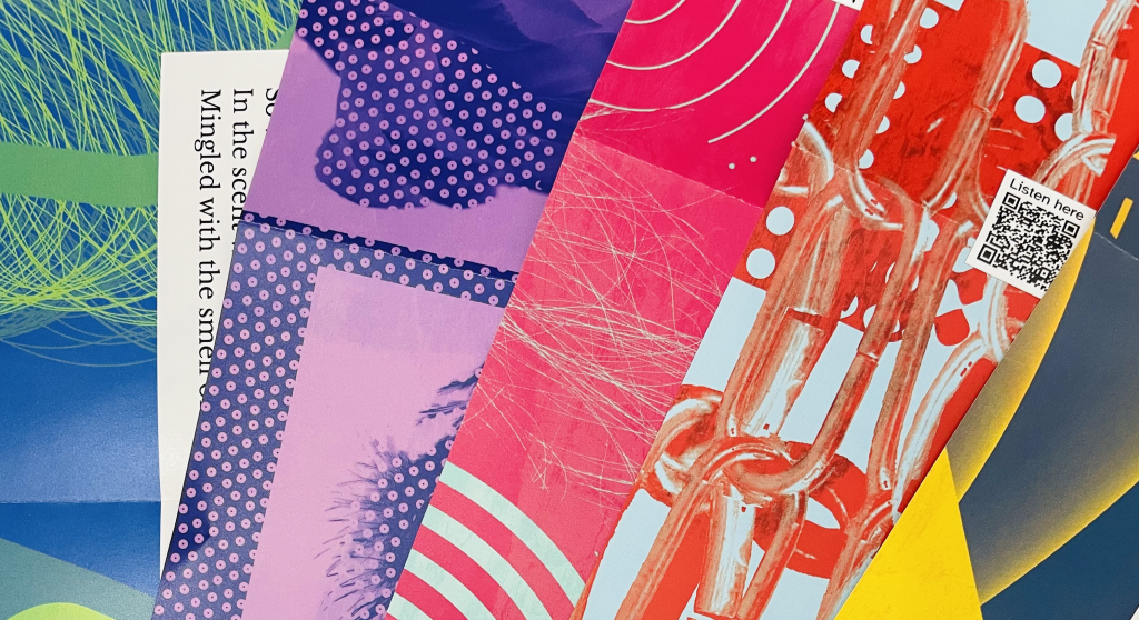 Close-up of different posters stacked on each other showing a colorful contrast fanned out